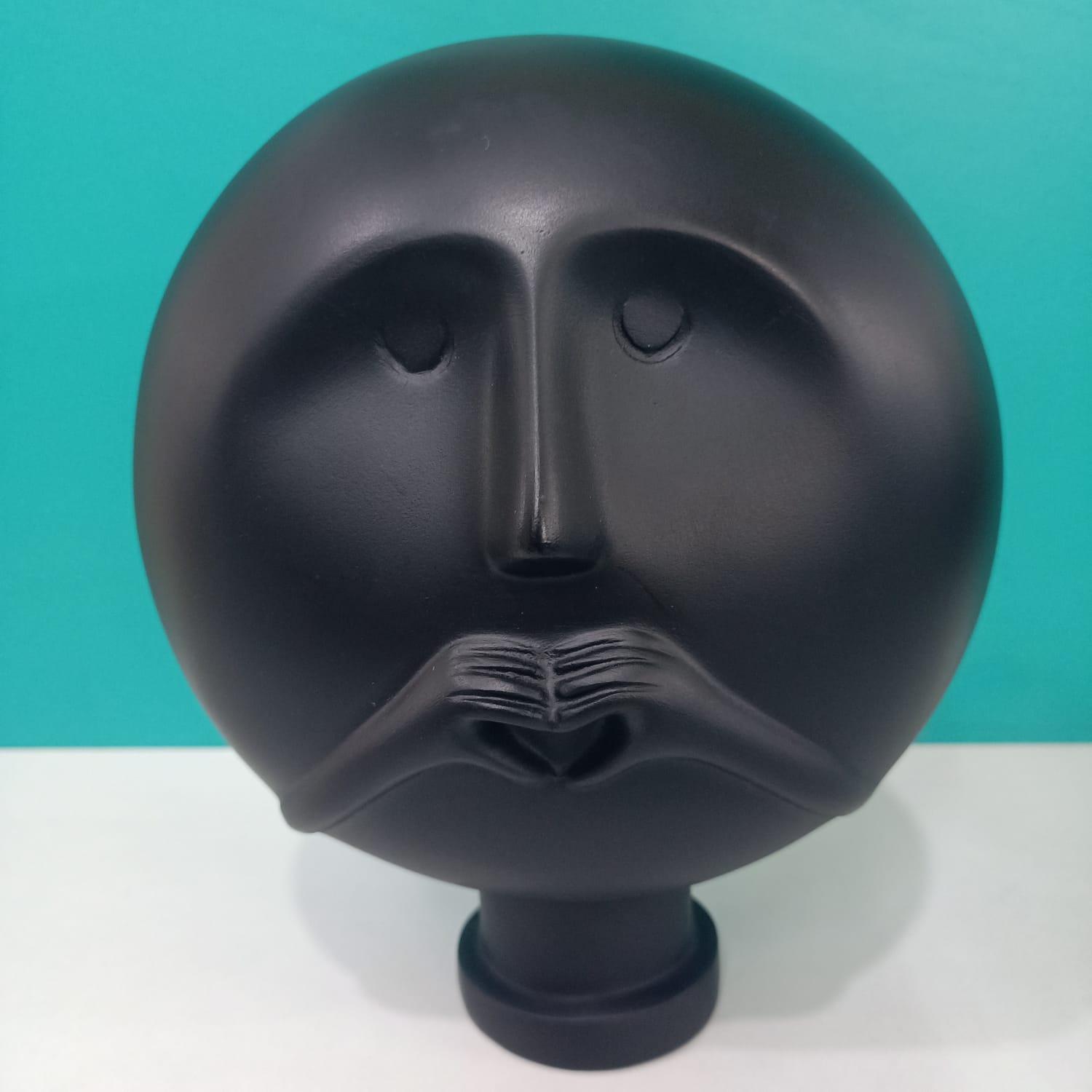 CLEVER CLAY MAN SCULPTURE